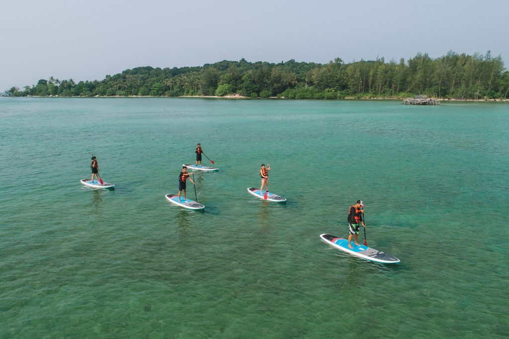 water sports Lagoi Bay - water sports Stand-up paddleboarding at Lagoi Bay Beach